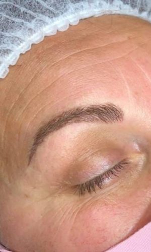 Soft, natural eyebrow tattoo for women aged 45 and over